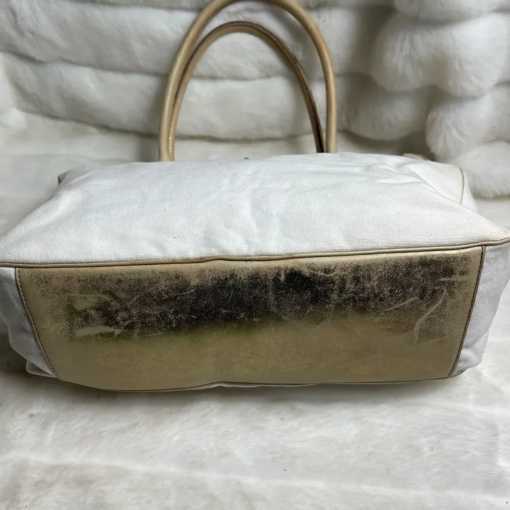 Vintage Kate spade beige canvas and faded gold trims shoulder bag.
